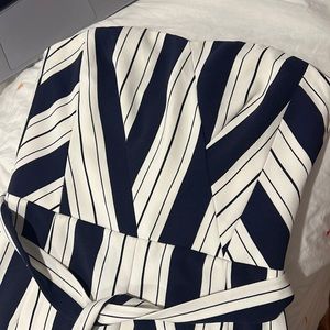 Strapless vertical stripes jumpsuit with tie around waist